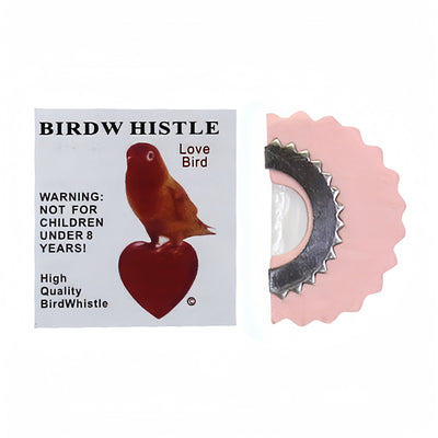 Red bird whistle with a serrated metal edge, next to a white label featuring a bird on a heart and a warning. - Image 5