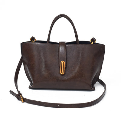 Bolso Bucket de Cuero Encerado Elegante y Portátil - Image 8