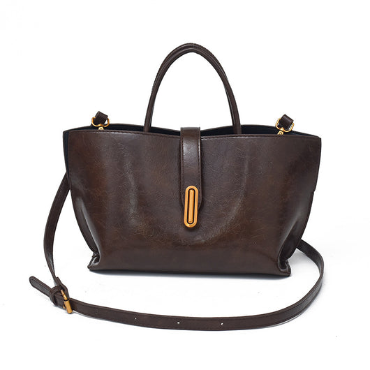 Bolso Bucket de Cuero Encerado Elegante y Portátil - Image 8