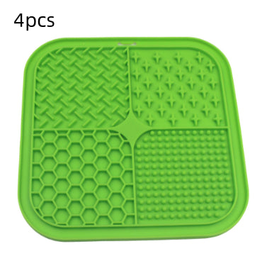 Gray silicone pet licking pad with four textured sections, designed for slow feeding and anti-choking. - Image 24