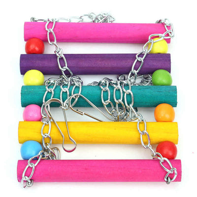 Colorful suspension bridge swing for birds, featuring wooden logs in green, purple, yellow, blue, and red, with small beads and metal chains. - Image 8