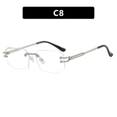 Rimless octagonal clear lens glasses with silver-toned metal temples and black ear tips, featuring decorative accents. - Image 7