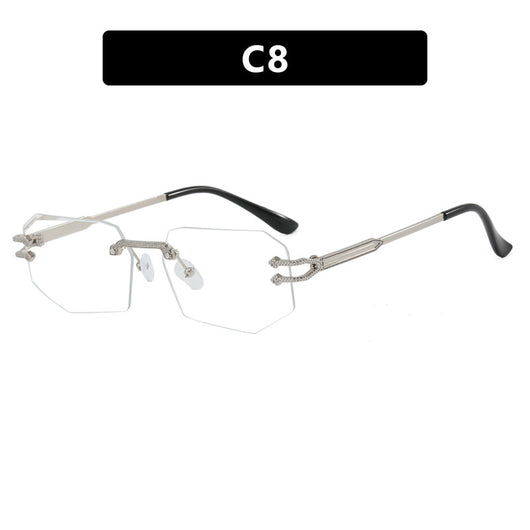 Rimless octagonal clear lens glasses with silver-toned metal temples and black ear tips, featuring decorative accents. - Image 7