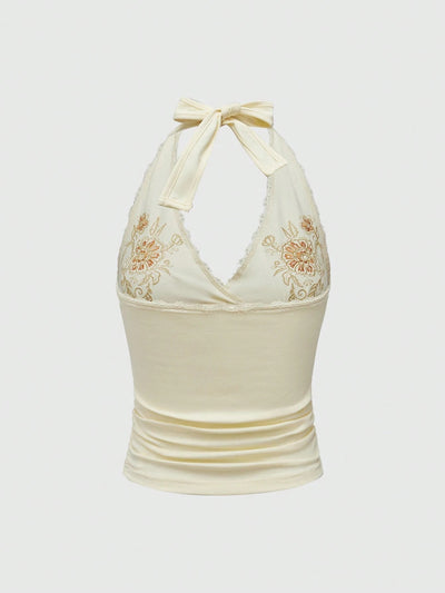 Chaleco Halter de Encaje Floral Bordado Ajustado y Estilizador - Image 8
