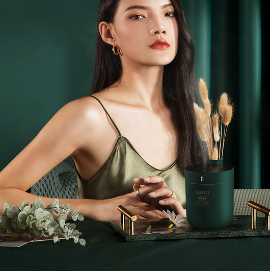 Dark green cylindrical humidifier with a black top, 300mL capacity, and a single control button. - Image 9