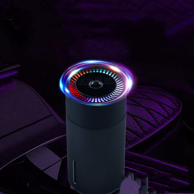Black cylindrical vehicular humidifier with a silver trim and a vertical indicator light on a white background. - Image 10