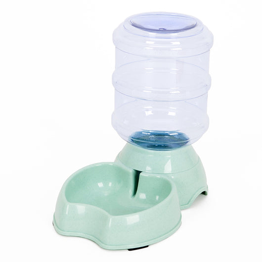 White pet feeding station with a stainless steel food bowl and a clear automatic water dispenser bottle. - Image 15