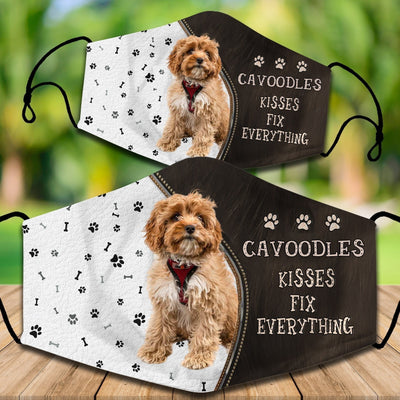 Two cotton face masks with a Bichon Frise dog, paw prints, and bones on a white and brown background. Text reads "Bichon Frise KISSES FIX EVERYTHING." - Image 24