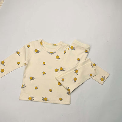 Light yellow infant long-sleeved pajama set with milk bottle and cookie print, suitable for homewear. - Image 29