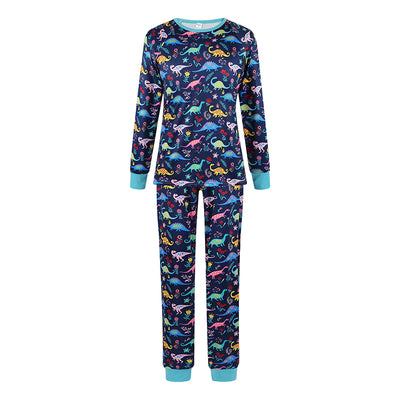 Matching family Christmas pajamas in green with a festive pattern of Santa, reindeer, and Christmas trees. - Image 6