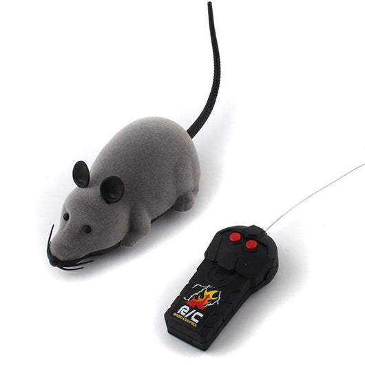 White remote control cat toy mouse with black ears and tail, next to a black remote control with red buttons. - Image 13