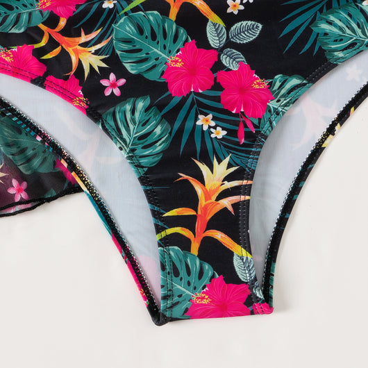 Multicolor tropical print three-piece swimsuit set with high-waisted bikini and sheer mesh cover-up on a beach. - Image 35