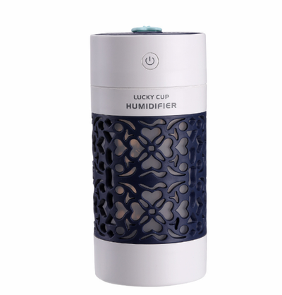 Light blue and white Lucky Cup humidifier with a decorative heart and floral cutout pattern. Features a power button. - Image 6