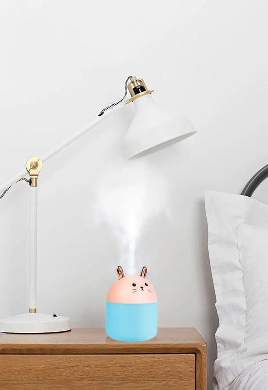 Cute sky blue and white mini USB rabbit humidifier with gold ears, ideal for home or office aromatherapy. - Image 9