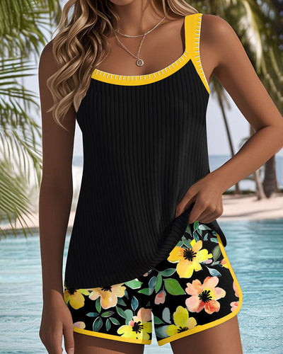 Women's grey floral print tankini swimsuit with square neckline and matching solid grey swim shorts with white trim. - Image 7