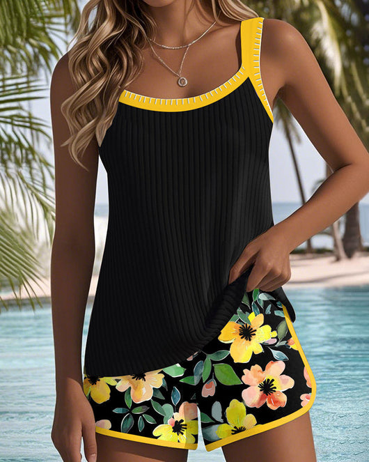 Women's grey floral print tankini swimsuit with square neckline and matching solid grey swim shorts with white trim. - Image 7