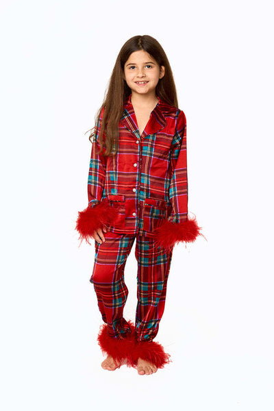 Young girl in a leopard print pajama set with black feather trim on the cuffs and ankles, wearing a pink glitter headband. - Image 33