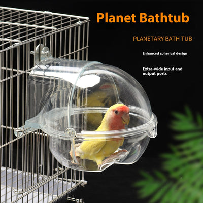 Transparent spherical bird bathtub with a perch, designed to attach to a bird cage, showing dimensions.