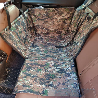Brown pet car mat with colorful dog pattern installed in a car's rear seat, protecting upholstery. - Image 11