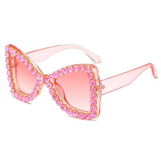 Pink butterfly frame sunglasses with purple gradient lenses and sparkling purple rhinestone embellishments. - Image 2