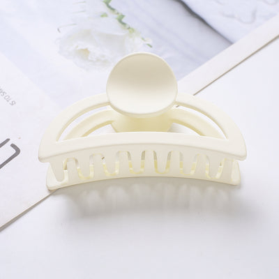 Frosted light blue rectangular hair claw clip with a gold-toned spring mechanism, ideal for securing hair. - Image 14
