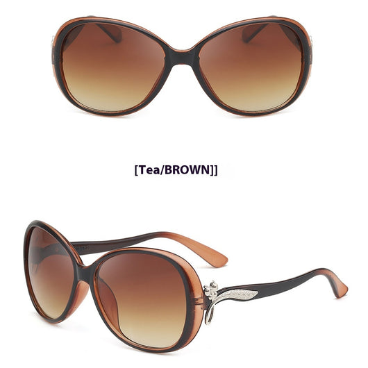 Brown oversized butterfly sunglasses with gradient lenses and a silver-tone floral accent on the temple. - Image 6