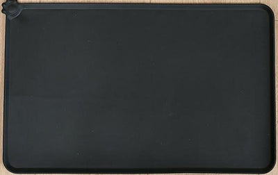 Blue rectangular silicone pet placemat with a raised edge and a small paw print detail in the corner. - Image 4
