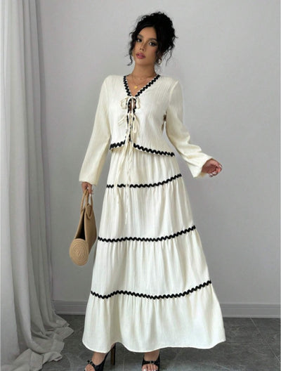 Conjunto Elegante con Blusa de Encaje y Falda Plisada con Mangas Farol - Image 15
