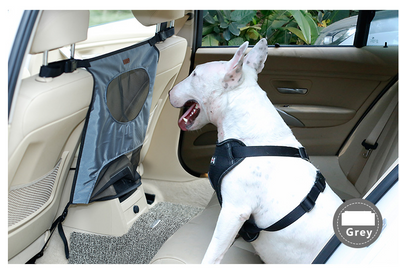 Grey pet car fence installed in a car's rear seat, separating the front and back, with a white Bull Terrier. - Image 7