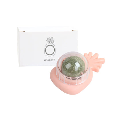 Orange carrot-shaped cat toy with a clear dome holding a rotating catnip ball, next to its white packaging box. - Image 7