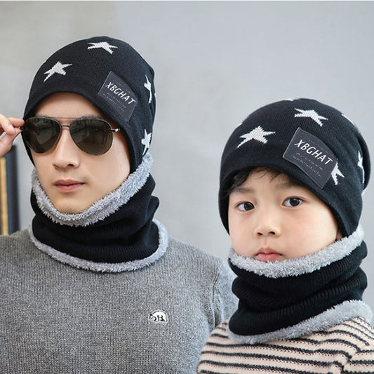 Brown knitted beanie with white five-pointed stars and a matching fleece-lined neck warmer on a man.