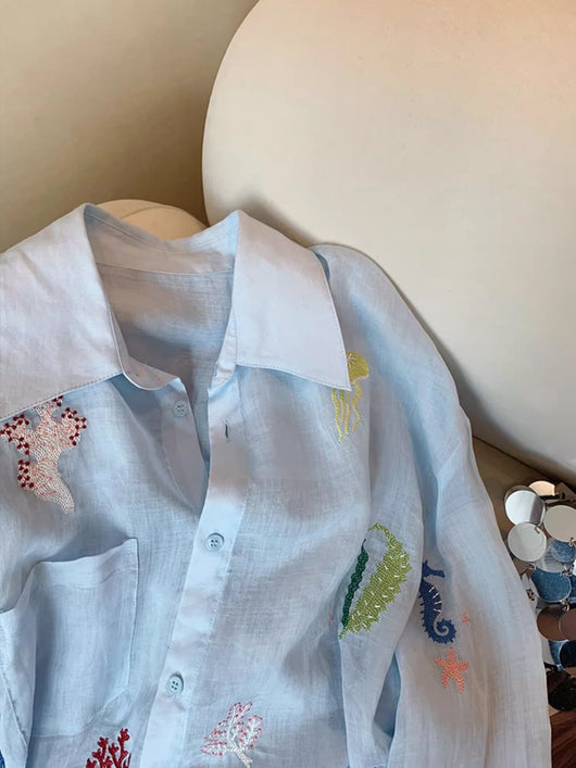 Blusa de Protección Solar con Bordado Floral para Mujer - Image 8