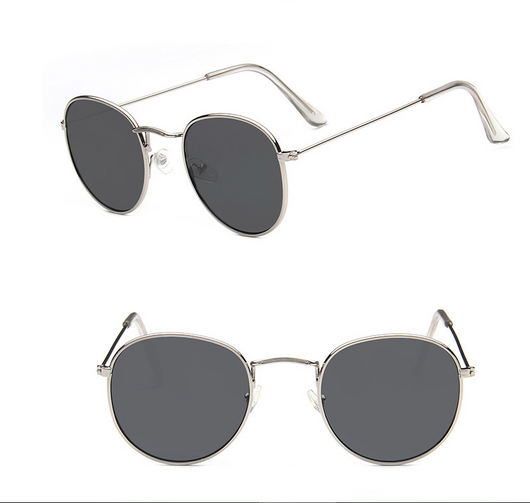 Two pairs of round gold-frame sunglasses, one with mirrored orange lenses and one with solid red lenses. - Image 10