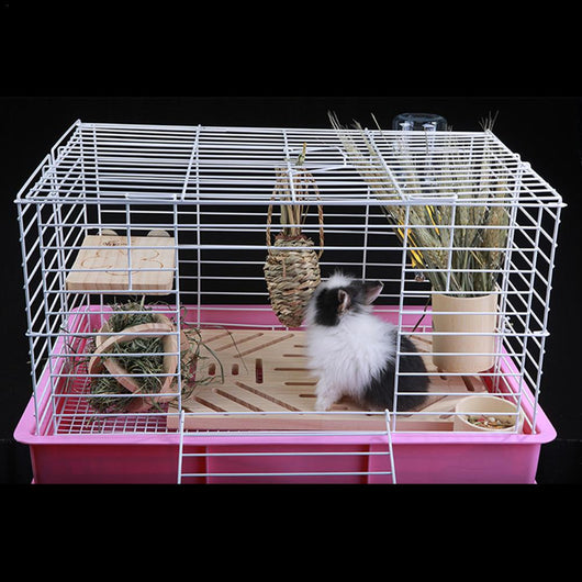 Two natural woven grass pet molars, shaped like carrots, with bundled grass tops for small animals to chew. - Image 4