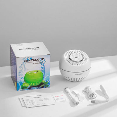 Dark green spherical humidifier with a textured top, control icons, and "HUMIDIFIER" printed on its side. - Image 2