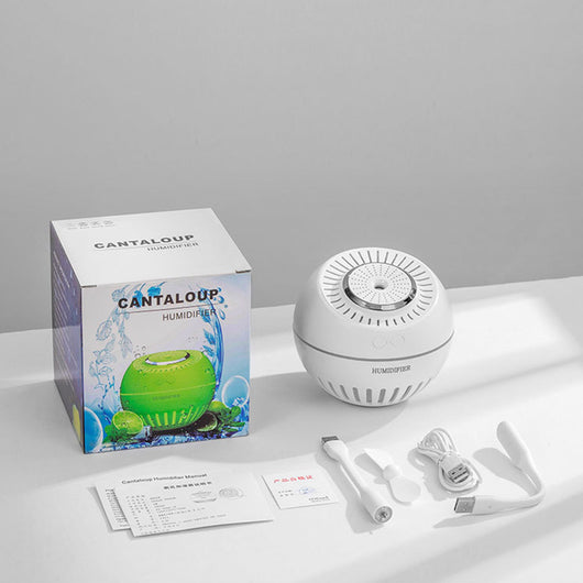 Dark green spherical humidifier with a textured top, control icons, and "HUMIDIFIER" printed on its side. - Image 2