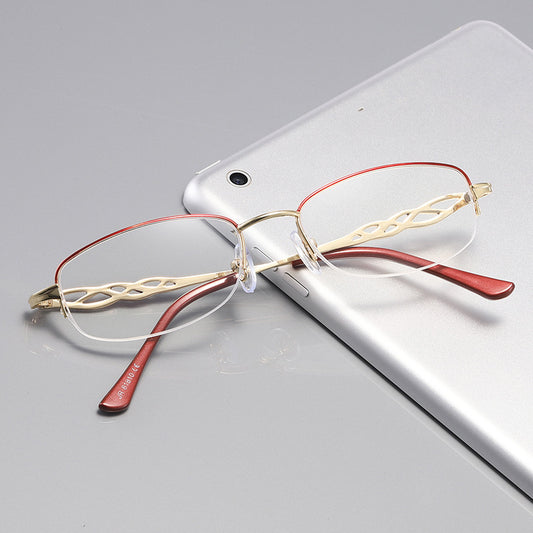 Gold half-rim anti-blue light reading glasses with red decorative temples and +1.50 magnification.
