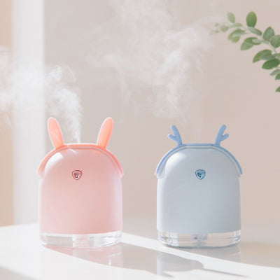 Yellow smart humidifier with cute animal ears and a gold emblem, featuring a transparent base for small spaces. - Image 14