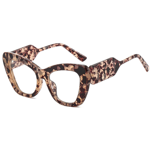 Pink cat-eye sunglasses with green temples and brown to pink gradient lenses on a white background. - Image 2