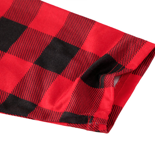 Baby in a red and black buffalo plaid long-sleeve pajama romper, viewed from the back with arms raised. - Image 16