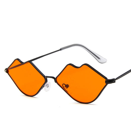 Retro red lips sunglasses with gold metal frames and brown gradient lenses on a white background.