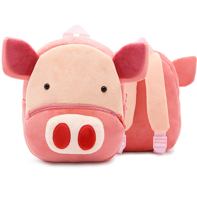 Cute green plush dinosaur backpack with red spikes, a blue front pocket, and yellow horn, for kindergarten children.