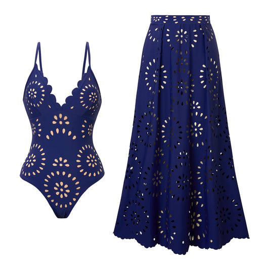 Navy blue women's one-piece swimsuit and matching midi skirt set with laser-cut floral patterns and scalloped edges. - Image 16