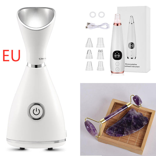 White facial steamer with a silver-toned steam nozzle and a prominent power button on the front, designed for home skincare. - Image 13