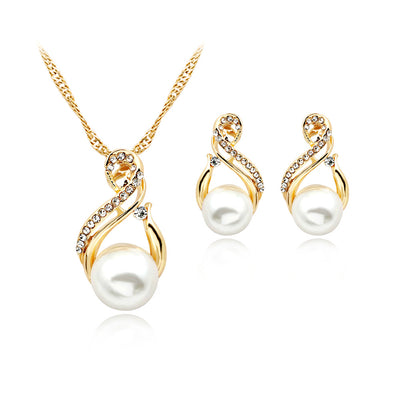 Gold-tone necklace and matching earrings set with white faux pearls and clear rhinestones, ideal for bridal or dinner wear. - Image 9