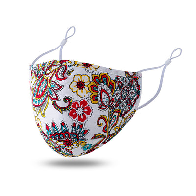 Teal cotton face mask with white floral pattern and brown leaves, featuring adjustable white ear loops. - Image 8