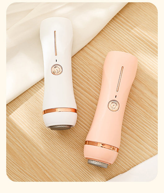 Orange pink portable electric foot grinder with a matte finish and rose gold accents, featuring a power button and grinding head. - Image 11