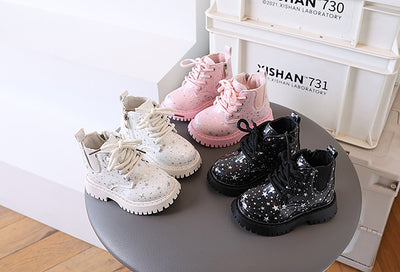 White toddler girls' boots with a holographic star pattern, lace-up front, and side zipper closure. - Image 6