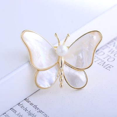Broche Perla Mariposa Fritilaria de Aguas Profundas - Elegancia Sofisticada