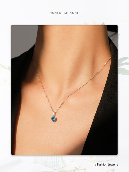 Women's light luxury jewelry set with a silver-toned necklace and hoop earrings, each featuring a sea blue artificial diamond pendant and clear artificial diamo - Image 14